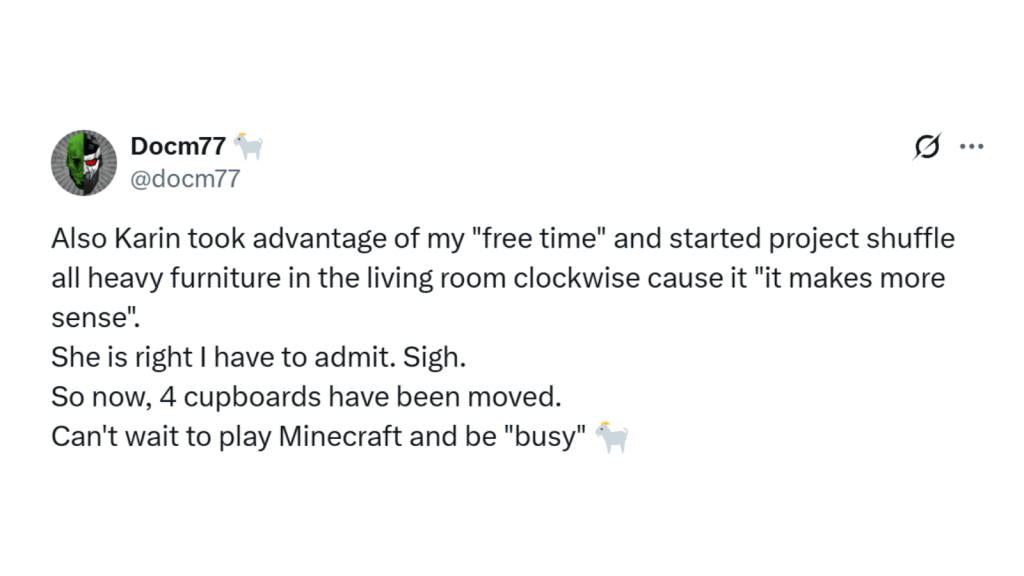 Screenshot of an X post from “Docm77” with a goat emoji (@docm77). He writes that Karin used his “free time” to start “project shuffle,” moving all the heavy living room furniture clockwise because “it makes more sense.” Four cupboards have been moved, and he sighs that she’s right, then jokes he can’t wait to play Minecraft and be “busy,” adding a goat emoji.