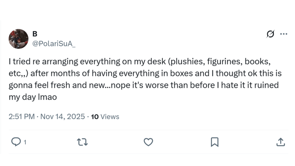 Screenshot of an X post from “B” (@PolariSuA_). They explain that they tried rearranging everything on their desk—plushies, figurines, books, and more—after months of the items being in boxes, expecting it to feel fresh and new, but instead it looks worse than before and ruined their day.