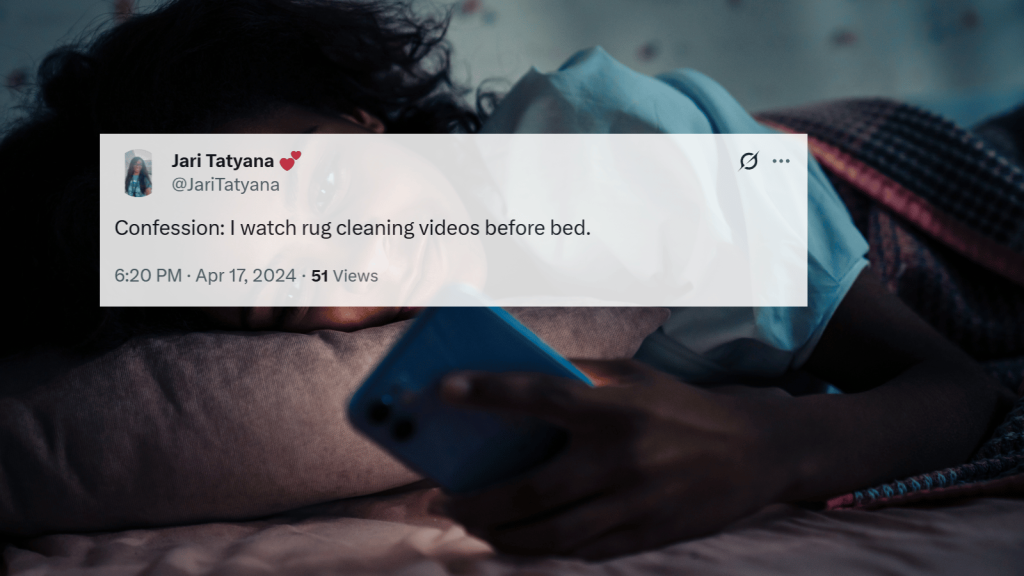 A tweet overlay on a dimly lit scene of a person lying in bed, holding a smartphone close to their face while resting on a pillow.