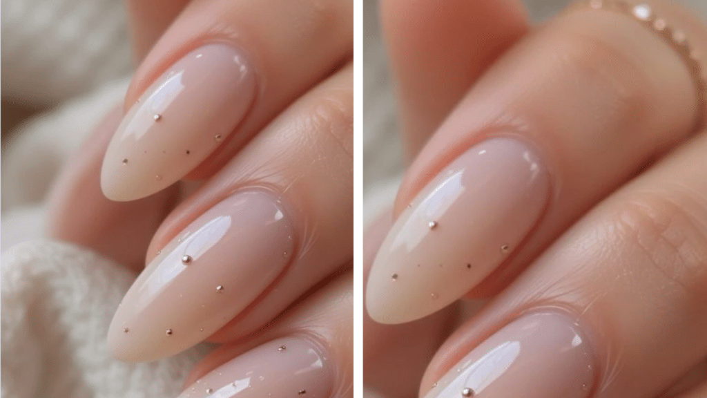 Almond nails in a milky nude shade with scattered tiny gold studs. Minimalist, delicate, and elegant, giving the design an old money Christmas nails aesthetic. Soft background textures reinforce the understated Christmas nails theme.